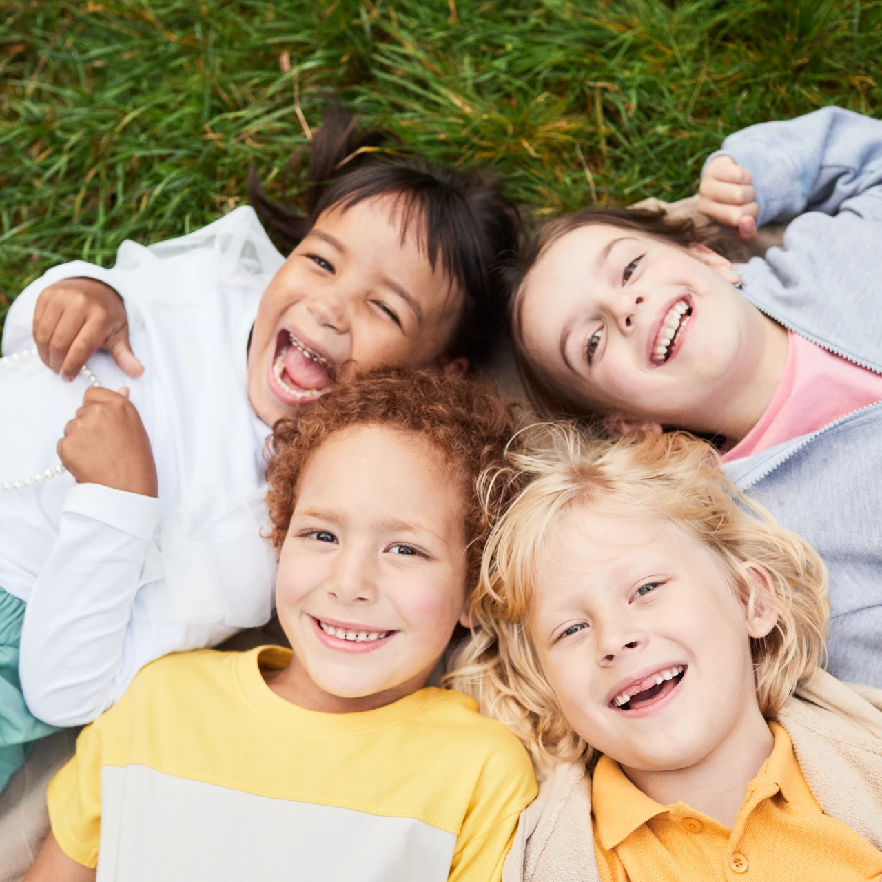 four children smiling | pediatric dentistry